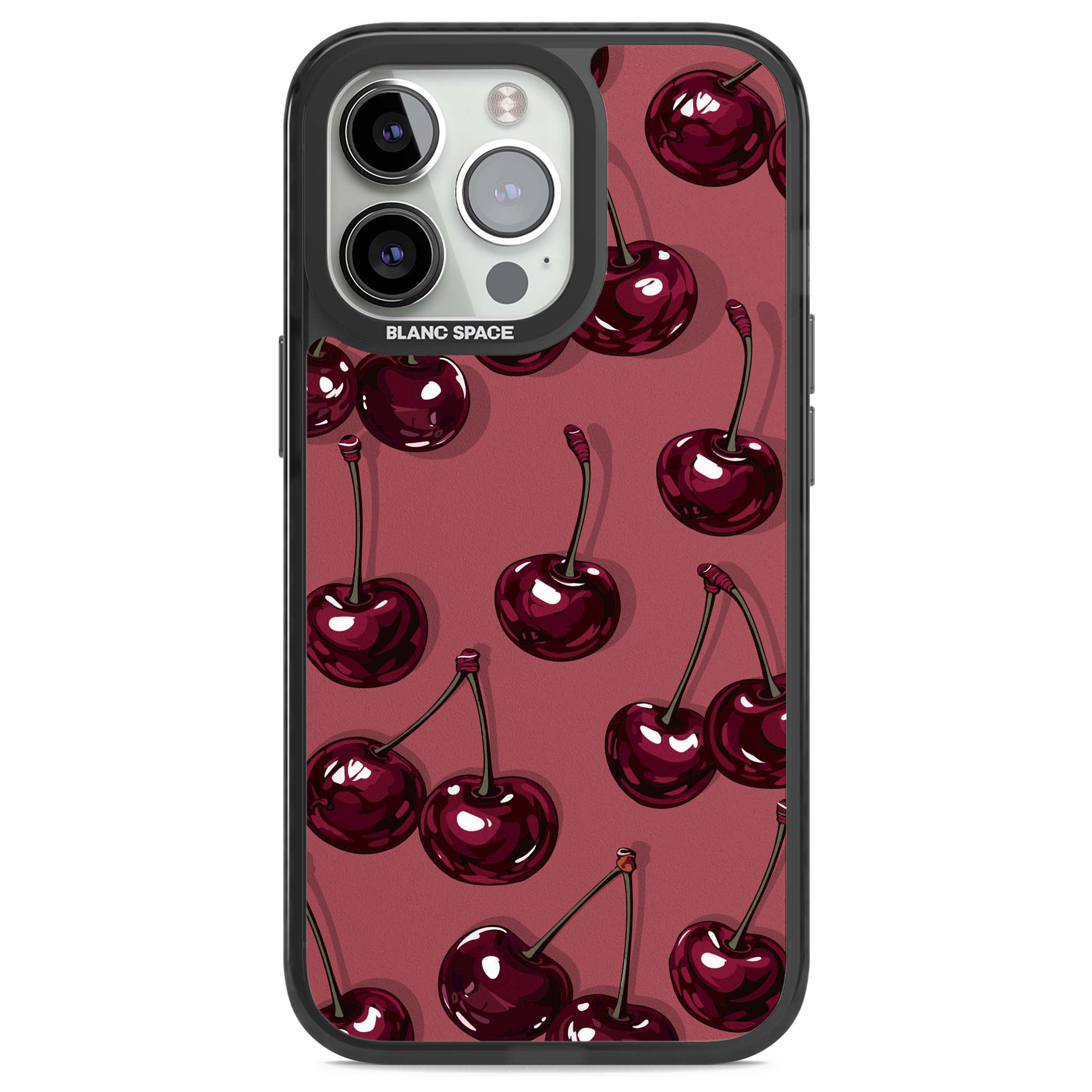 Cherry Rebel coquette iPhone case featuring glossy burgundy cherries on a dusty rose background | Black Impact Magsafe case for iPhone 13 Pro, iPhone 14 Pro, iPhone 15 Pro