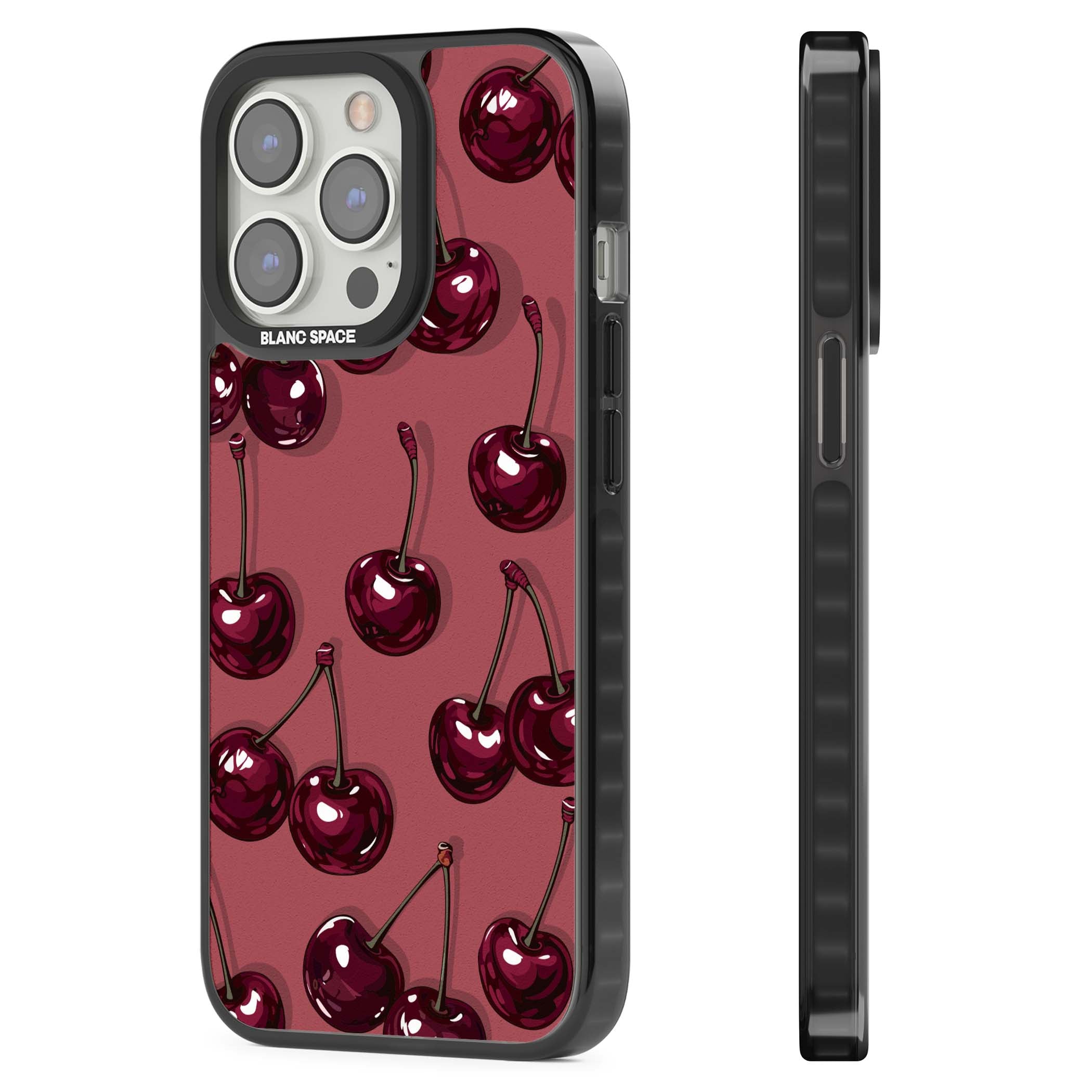 Cherry Rebel coquette iPhone case featuring glossy burgundy cherries on a dusty rose background | Black Impact Magsafe case for iPhone 13 Pro, iPhone 14 Pro, iPhone 15 Pro
