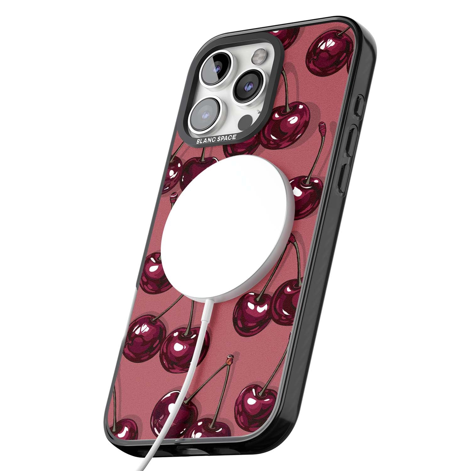 Cherry Rebel coquette iPhone case featuring glossy burgundy cherries on a dusty rose background | Black Impact Magsafe case for iPhone 16 Pro, iPhone 16 Pro Max