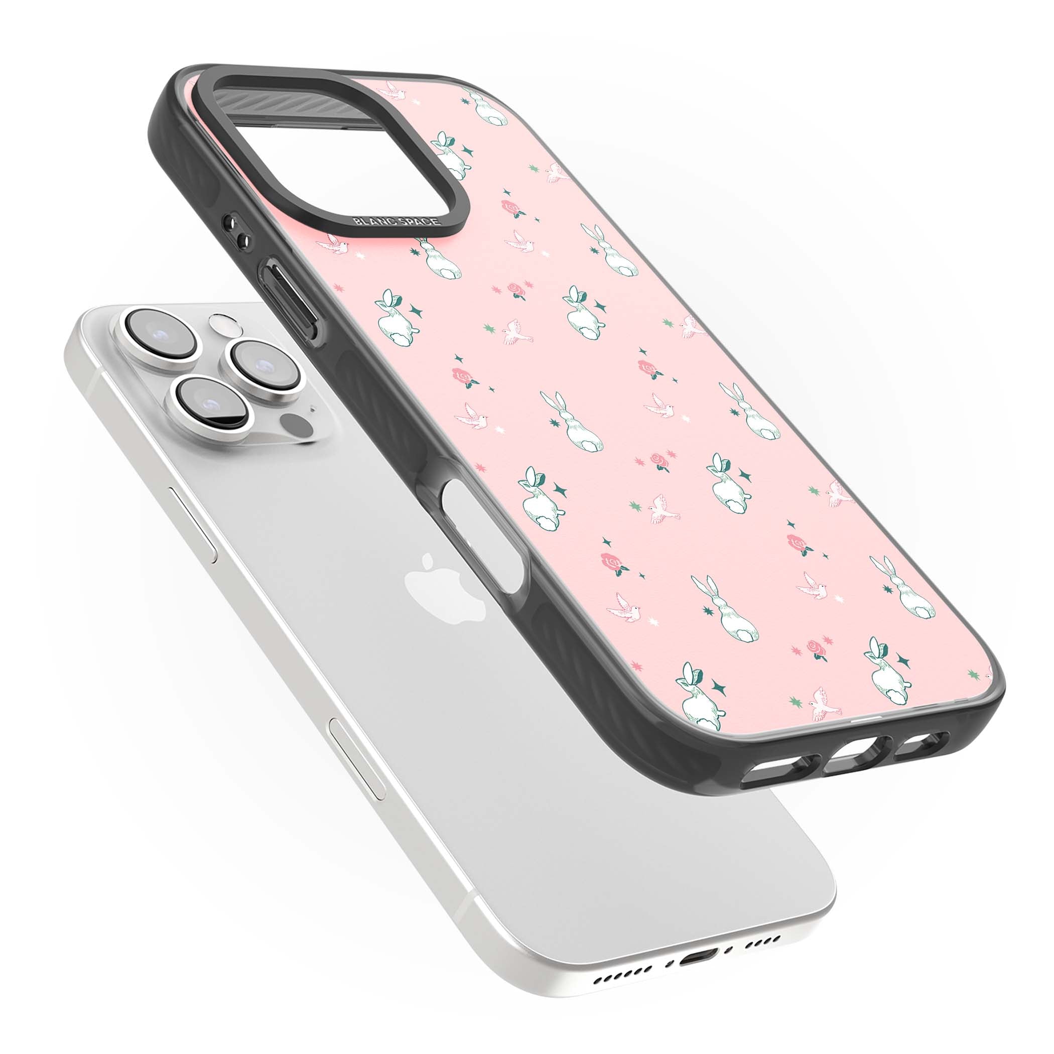 Bunny Garden kawaii iPhone case featuring white rabbits, pink roses, doves and stars on pink background | Black Impact Magsafe case for iPhone 16 Pro, iPhone 16 Pro Max