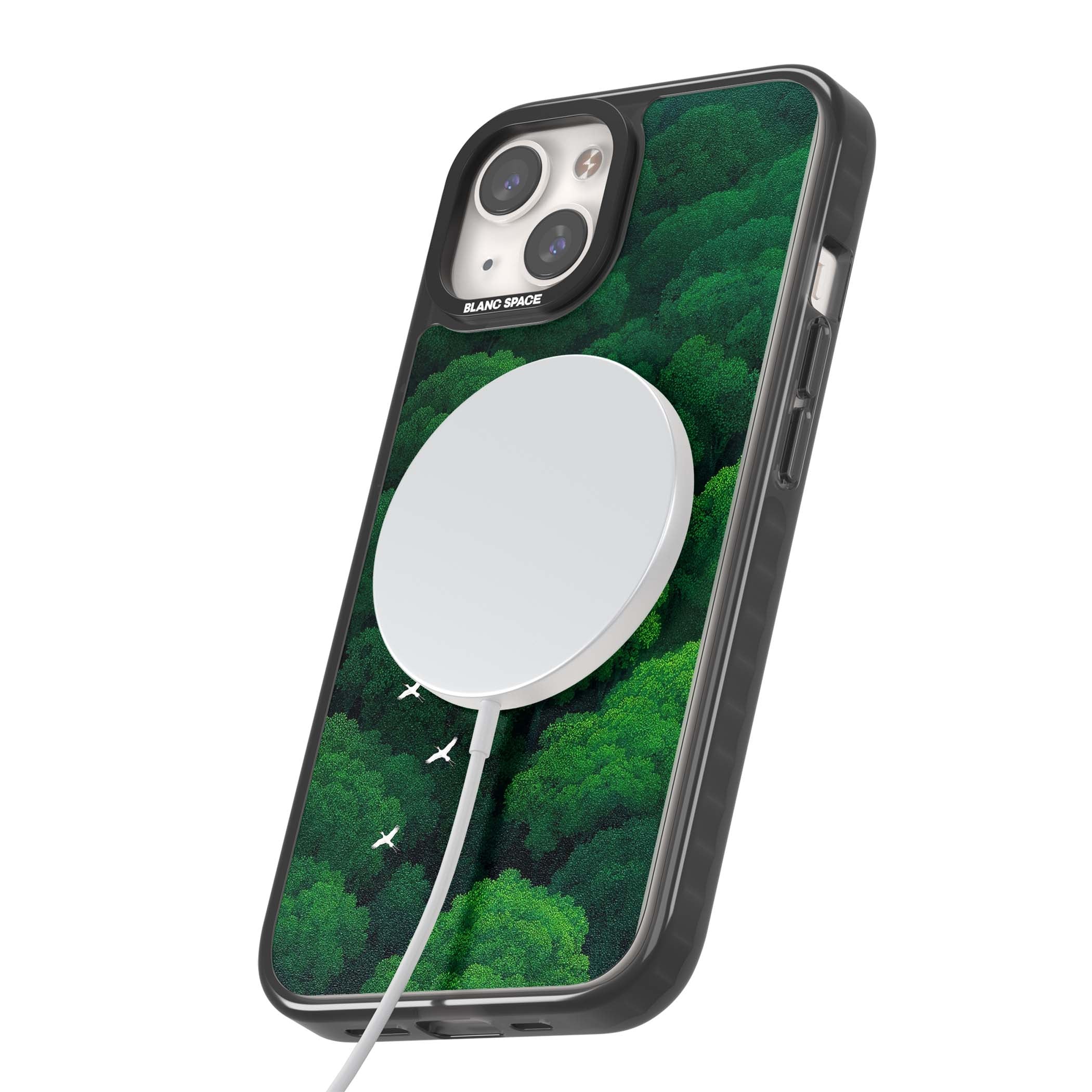 Grove Migration forest iPhone case featuring white cranes flying over lush green treetop canopy | Black Impact Magsafe case for iPhone 13, iPhone 14, iPhone 15