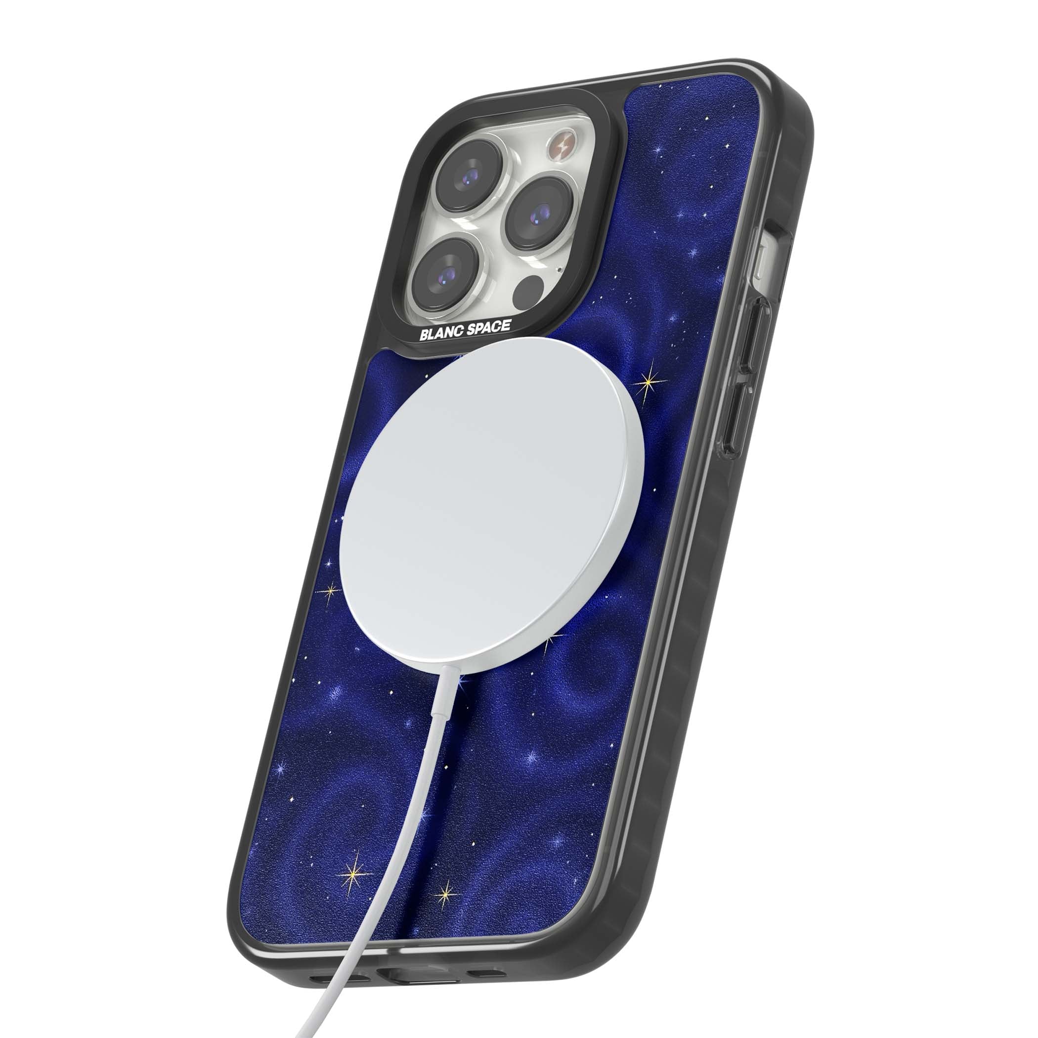 Indigo Cosmos celestial iPhone case featuring swirling navy night sky and sparkling golden stars | Black Impact Magsafe case for iPhone 13 Pro, iPhone 14 Pro, iPhone 15 Pro
