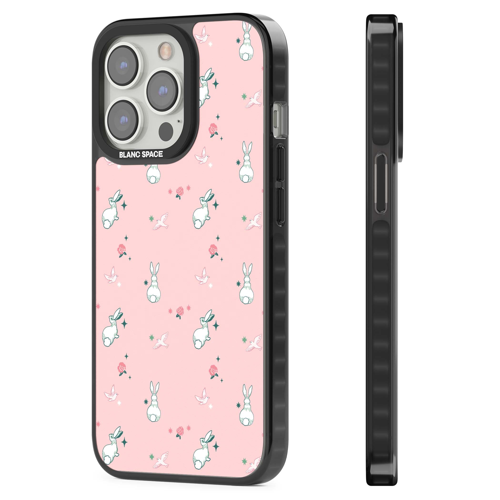 Bunny Garden kawaii iPhone case featuring white rabbits, pink roses, doves and stars on pink background | Black Impact Magsafe case for iPhone 13 Pro, iPhone 14 Pro, iPhone 15 Pro