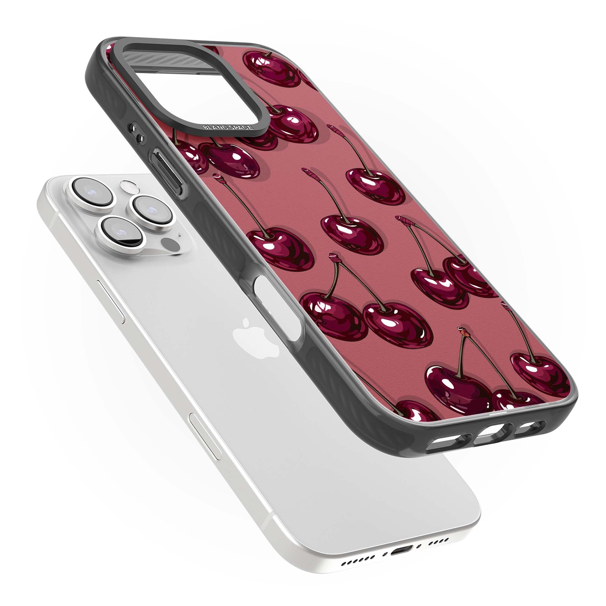 Cherry Rebel coquette iPhone case featuring glossy burgundy cherries on a dusty rose background | Black Impact Magsafe case for iPhone 16 Pro, iPhone 16 Pro Max