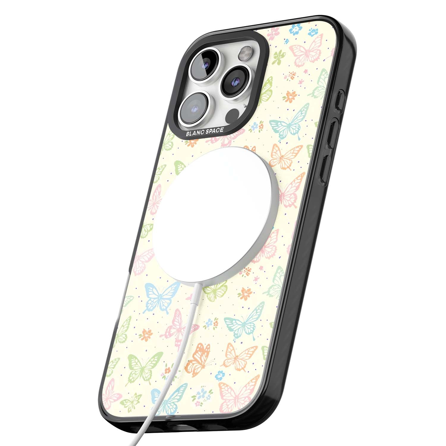 Sugar Wings cottagecore iPhone case featuring rainbow pastel butterflies, tiny wildflowers, and a cream background | Black Impact Magsafe case for iPhone 16 Pro, iPhone 16 Pro Max