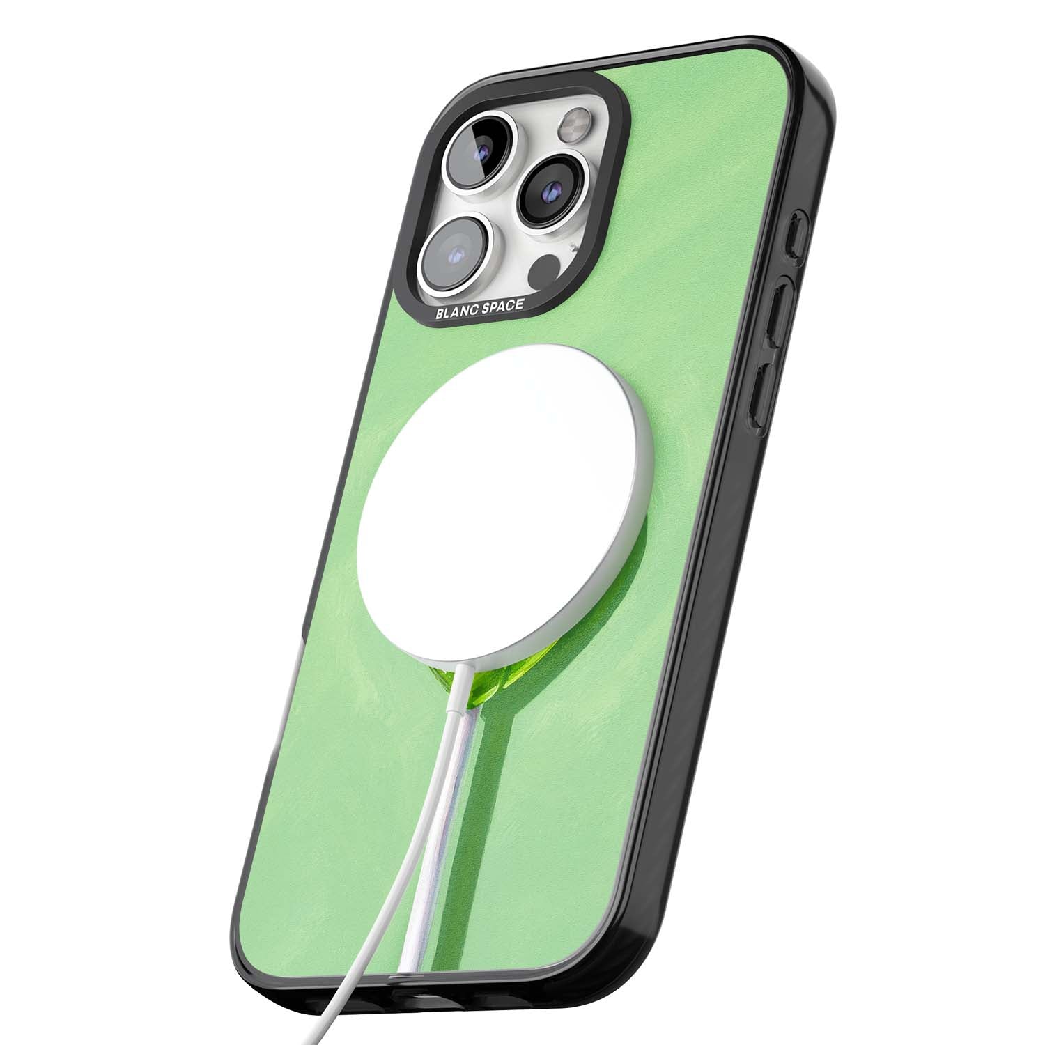 Green Lollipop candy art iPhone case featuring a glossy green heart-shaped lollipop on a painted pastel green background | Black Impact Magsafe case for iPhone 16 Pro, iPhone 16 Pro Max